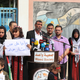 Nisreen’s husband Hazem speaks as he and the couple’s children wait to be reunited with Nisreen at a border crossing in Gaza on October 18, 2021.